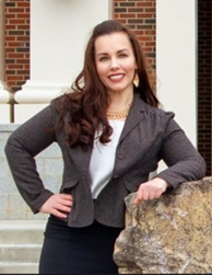 Photograph of Tiffany Hall smiling